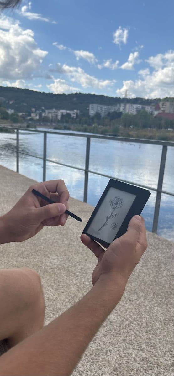Sketching a flower on Kairon outdoors
